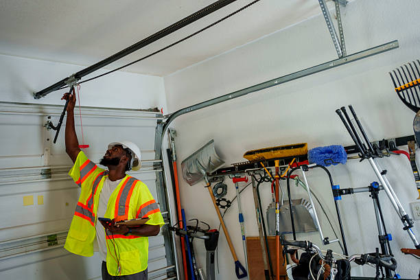 Professional Garage Door Panel Replacement technician working in Carmel, IN